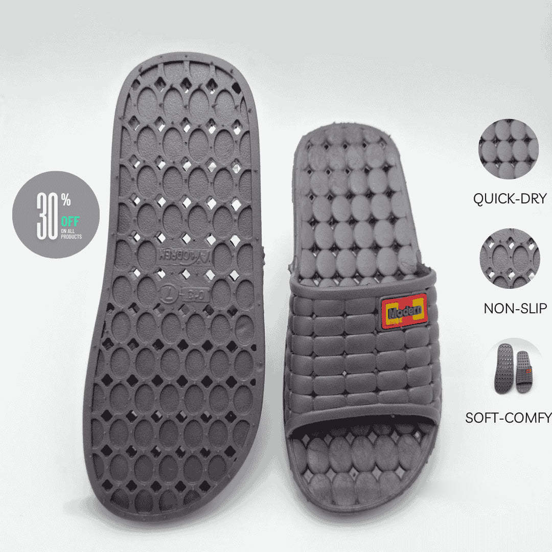 Gray slide sandals with textured sole and brand logo on a white background
