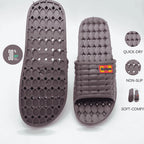 Maroon slide sandal with textured sole and brand logo on a white background