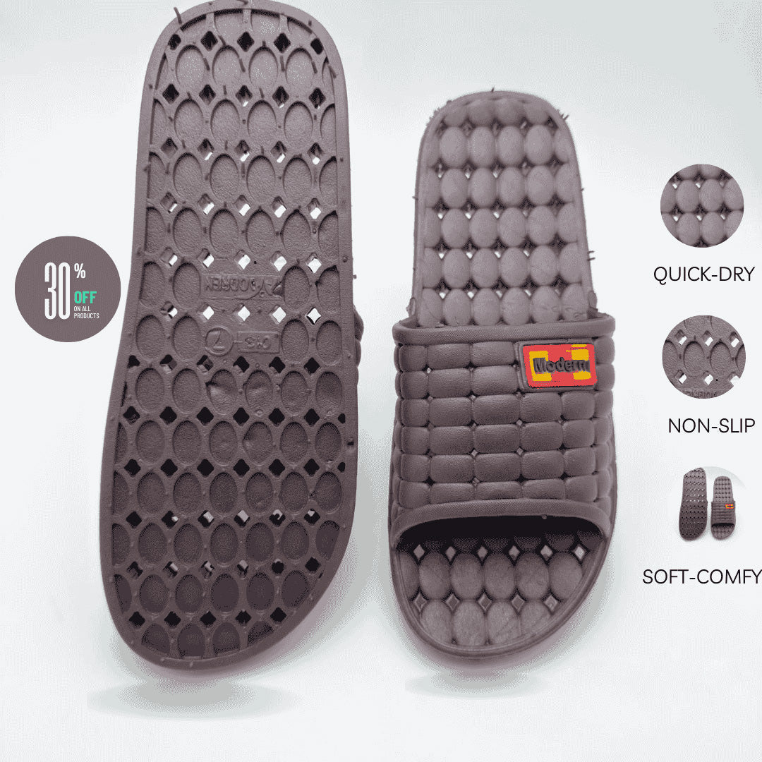 Maroon slide sandal with textured sole and brand logo on a white background